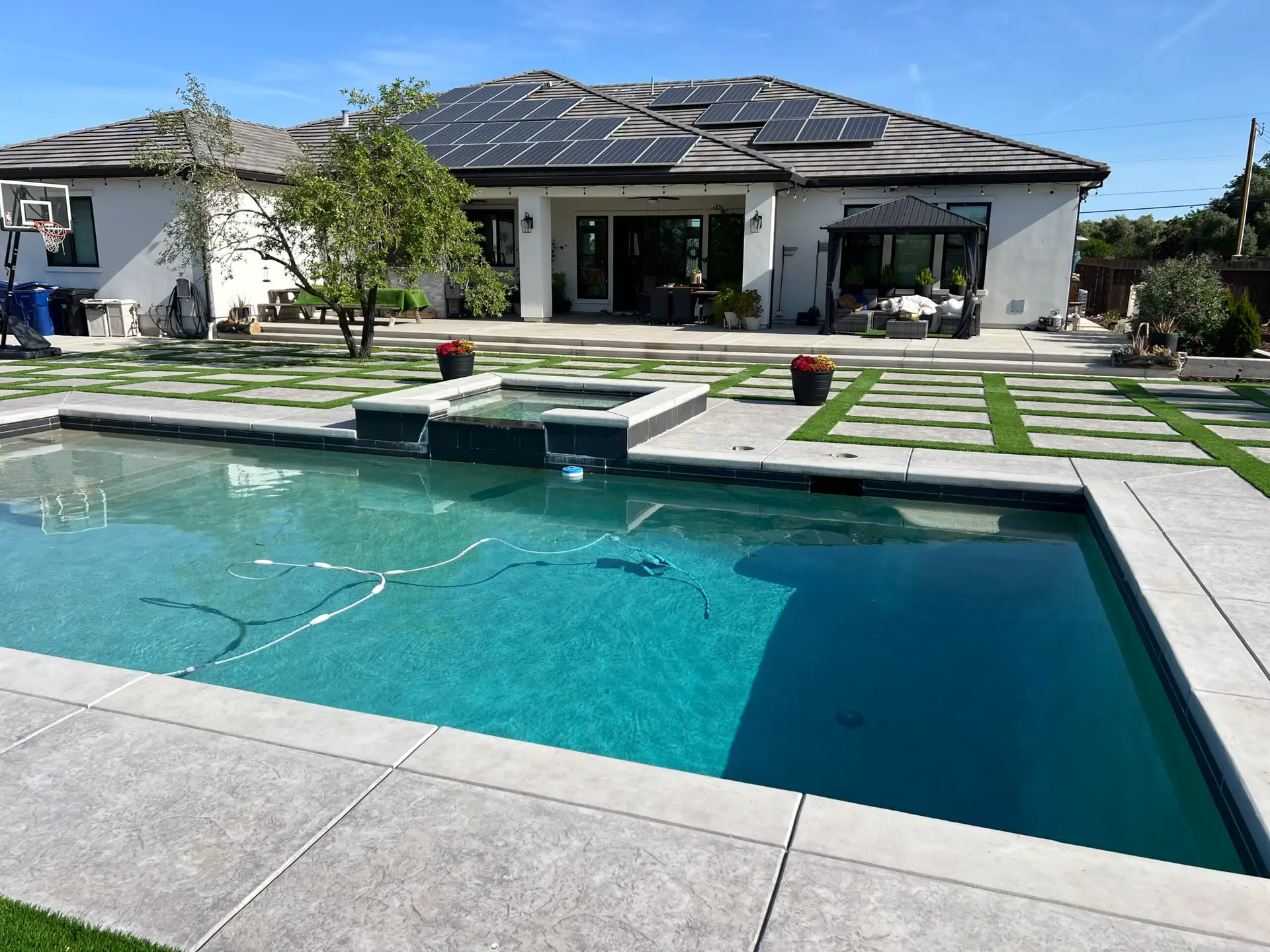 Weekly pool service at a Riverside, CA backyard pool